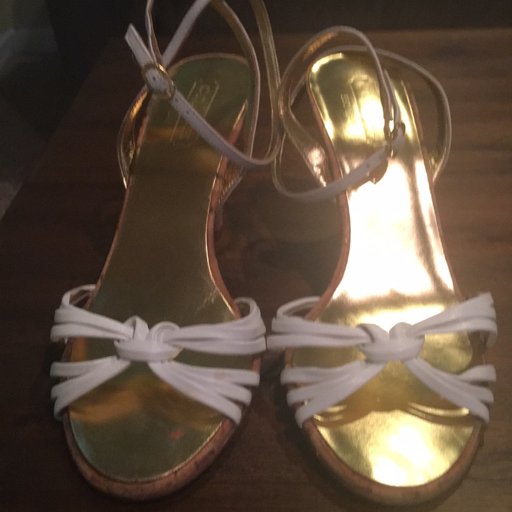 Coach white high heels.